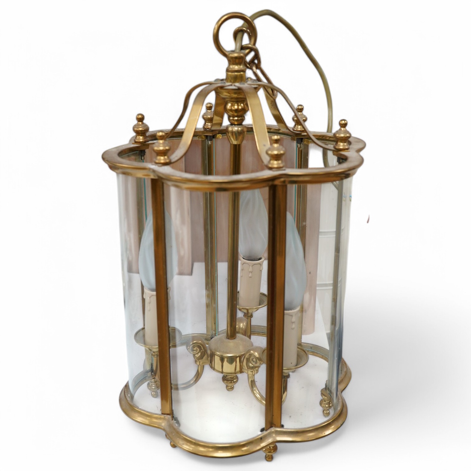 A brass and glass three light hall lantern, 44cm high. Condition - good